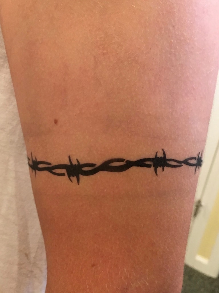 Airbrush roses tattoo on arm